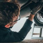 Vehicle Maintenance - Man Fixing Vehicle Engine